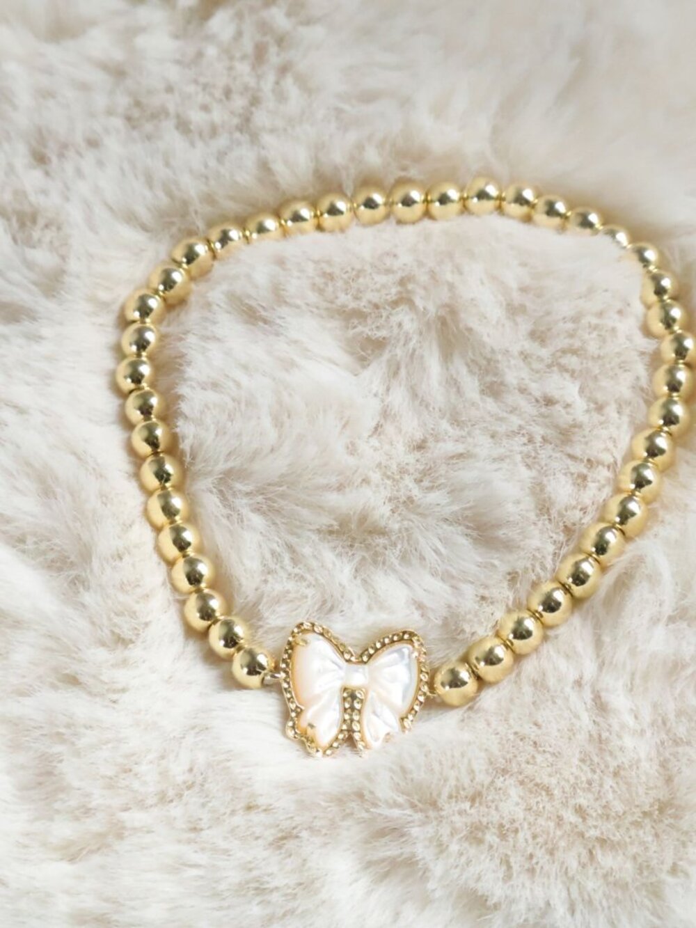 Kendra Scott Haley Bow Gold Mother-of-Pearl Stretch Bracelet